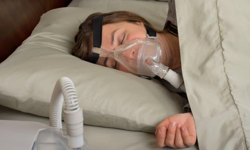 person sleeping with cpap